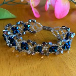 Vintage handmade articulating cuff bracelet with blue beads and silver strands
